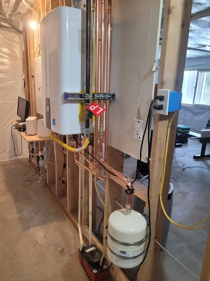 Licensed plumber repairing a kitchen sink in Mount Healthy